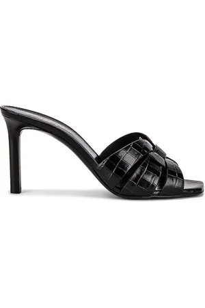 Saint Laurent Tribute Embossed Croc Mules in - Black. Size 37.5 (also in ).