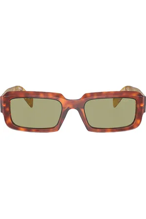 Prada Rectangle Sunglasses in - Brown. Size all.