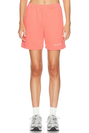 Sporty & Rich Serif Logo Soft Gym Short in - Coral. Size XS (also in ).