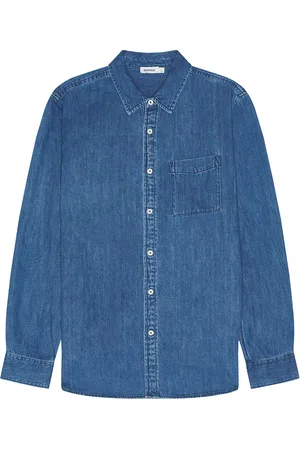 Simkhai Dwayne Chambray Shirt in - Denim-Medium. Size L (also in M).