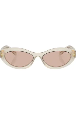 Prada Oval Sunglasses in - Neutral. Size all.