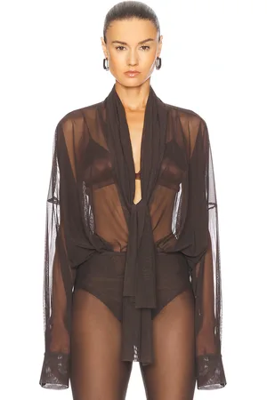 Norma Kamali Super Oversized Boyfriend Shirt Bow Bodysuit in - Chocolate. Size L (also in M, S, XS).