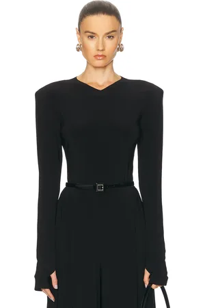 Norma Kamali Long Sleeve Shoulder Pad V Neck Top in - . Size L (also in ).