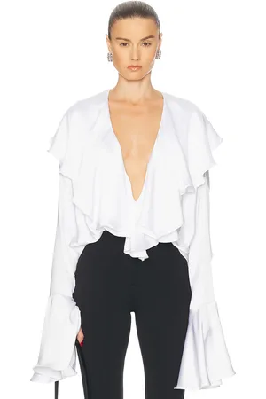 Norma Kamali Long Sleeve Deep V Ruffle Bodysuit in - White. Size L (also in M, S, XS).