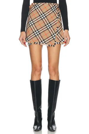Burberry Kilt Mini Skirt in - Brown. Size 0 (also in 2).