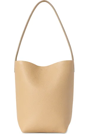 The Row Small North South Tote Bag in - Nude. Size all.