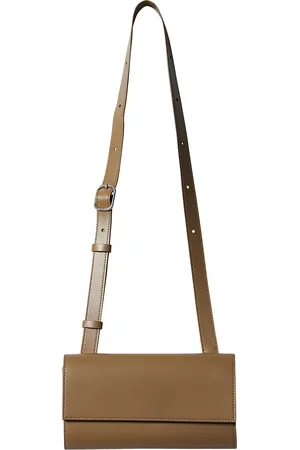 The Row Belt Flap Bag in - Brown. Size all.