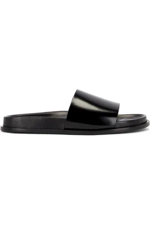 Saint Laurent Nichols Slide Sandal in - Black. Size 36 (also in 36.5, 37, 37.5, 38, 39, 39.5, 40, 41).