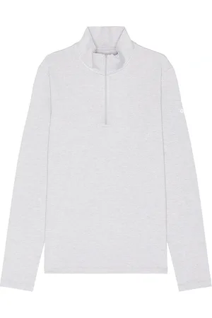 alo Conquer 1/4 Zip Reform Long Sleeve in - Light Grey. Size L (also in ).