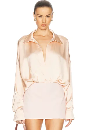 Norma Kamali Super Oversized Boyfriend Shirt Bodysuit in - Blush. Size L (also in XS, S, M).