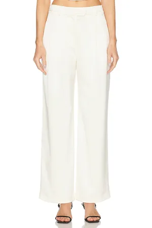 FLEUR DU MAL Satin Relaxed Pant in - Ivory. Size 0 (also in 4, 6, 8).