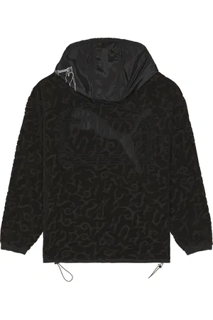 PUMA X Aries Light Pullover Hoodie in - Black. Size L (also in S, M, XL).
