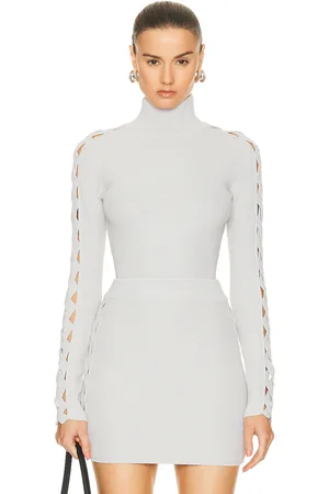 Alaïa Long Sleeve Turtleneck Top in - Light Grey. Size 34 (also in ).