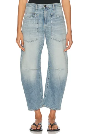 NILI LOTAN Shon Curved Leg in - Blue. Size 25 (also in 26, 27, 28, 29, 30, 31).