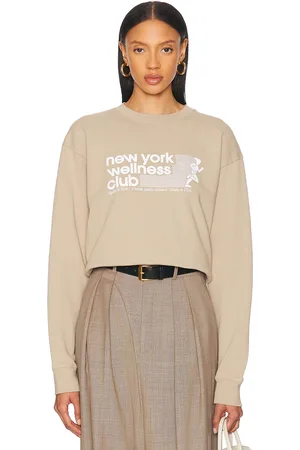 Sporty & Rich USA Wellness Club Crewneck Sweatshirt in - Tan. Size L (also in M, S, XL, XS).