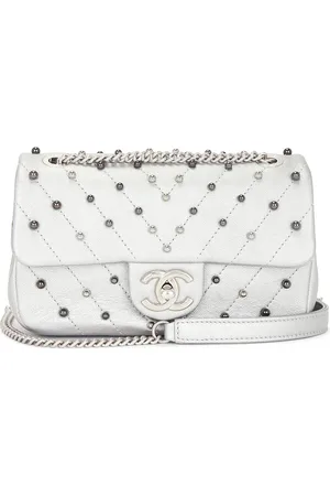 CHANEL Lambskin Mini Stud Wars Flap Bag in - Metallic . Size all.