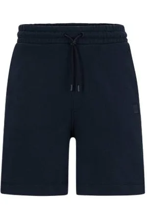 HUGO BOSS Relaxed-fit shorts in cotton terry with logo badge - Ramadan Edit