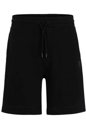 HUGO BOSS Relaxed-fit shorts in cotton terry with logo badge - Ramadan Edit