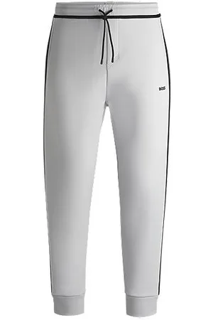 HUGO BOSS Cotton-blend tracksuit bottoms with tape and logo