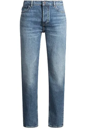HUGO BOSS Tapered-fit jeans in stonewashed denim