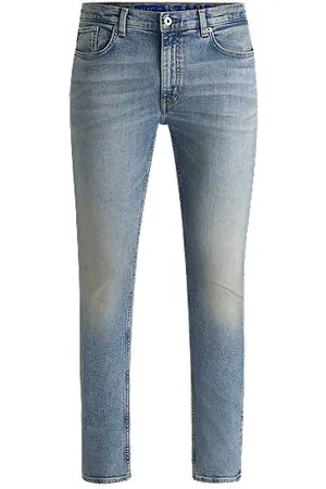 HUGO BOSS Extra-slim-fit jeans in stonewashed blue stretch denim