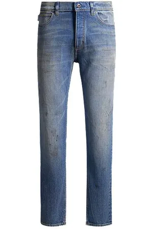 HUGO BOSS Tapered-fit jeans in mud-washed denim