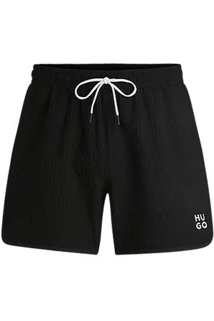 HUGO BOSS Waffle-structured swim shorts with embroidered stacked logo