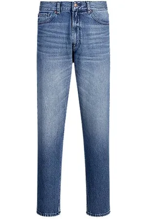 HUGO BOSS Relaxed tapered-fit jeans in vintage-wash denim