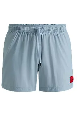 HUGO BOSS Fully lined swim shorts with red logo label