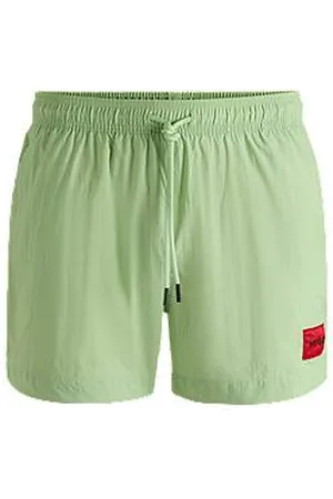 HUGO BOSS Fully lined swim shorts with red logo label