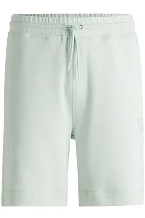 HUGO BOSS Relaxed-fit shorts in cotton terry with logo badge - Ramadan Edit
