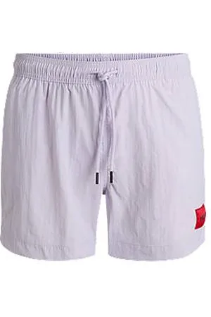 HUGO BOSS Fully lined swim shorts with red logo label