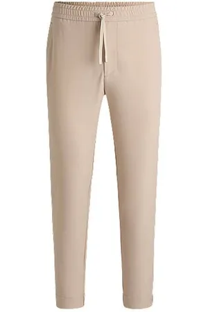 HUGO BOSS Tapered-fit trousers in water-repellent stretch fabric - Ramadan Edit