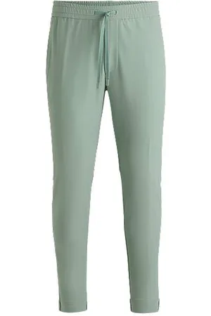 HUGO BOSS Tapered-fit trousers in water-repellent stretch fabric - Ramadan Edit