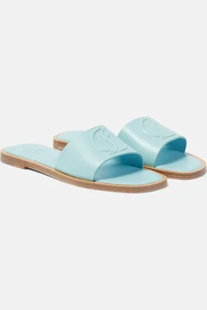 Christian Louboutin CL embossed leather mules