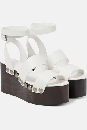 Alaïa AlaÃ¯a Leather wedge sandals