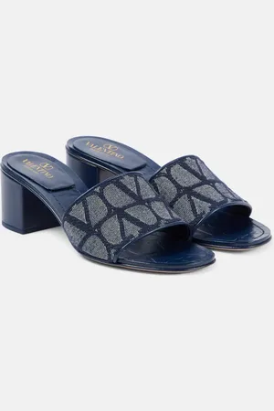 VALENTINO GARAVANI Toile Iconographe leather-trimmed denim slides