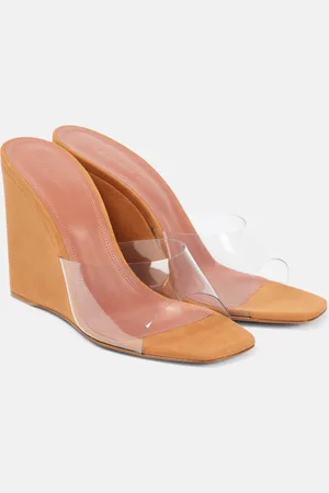 Amina Muaddi Lupita Half Glass PVC and suede wedge mules