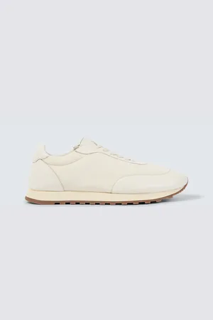 The Row Owen leather-trimmed sneakers
