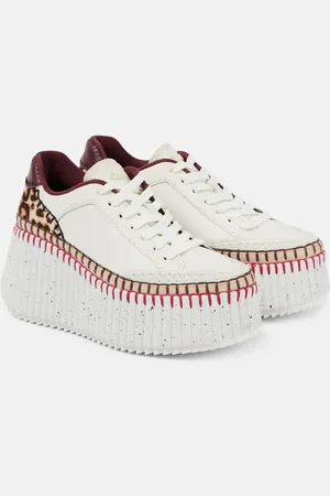 Chloé ChloÃ© Nana studded leather wedge sneakers
