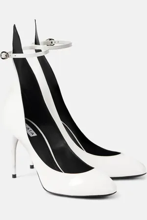 Alaïa AlaÃ¯a DÃ©colletÃ© 90 patent leather pumps