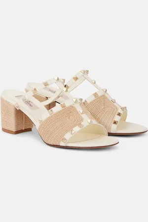 VALENTINO GARAVANI Rockstud leather and raffia mules