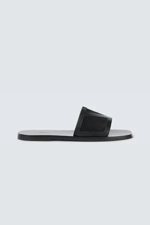 VALENTINO GARAVANI Viva Superstar leather and suede slides