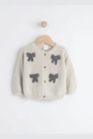 Next 3D Bows Baby 100% Cotton Knitted Cardigan (0mths-2yrs)