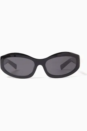 Miu Miu Oval Sunglasses in Acetate
