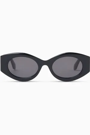 Alaïa Oval Sunglasses in Acetate