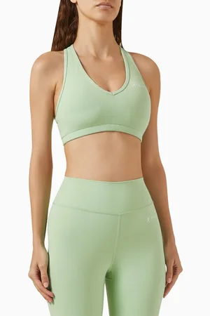 Sporty & Rich Runner Script V-Neck Sports Bra in Stretch Nylon