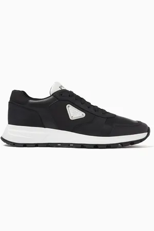 Prada Logo Plaque Sneakers in Leather & Nylon