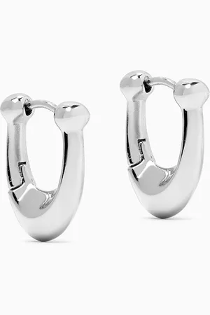 Coach Signature C Huggie Earrings in Metal