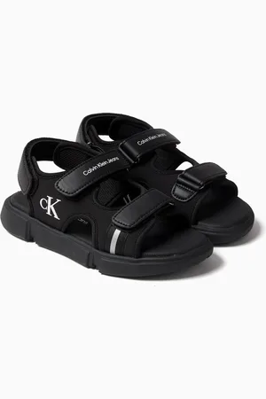 Calvin Klein Logo-embossed Sandals in Faux Leather & Fabric